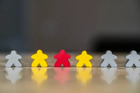 Iconic representation of virus infection diffusion with meeple or game piece 写真素材