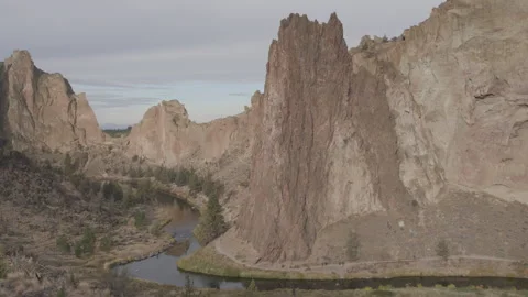 Iconic Rock Formations Rising Above Crooked River, Smith Rock Stock Footage 332363719