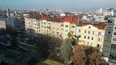 Iconic Saint Sofia Statue at Sofia Square, Traffic across the streets of Stock Footage 248196996