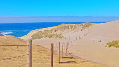 Iconic, sandy Cape Kiwanda beach in Oregon by Pacific Coast Stock Footage 69299799