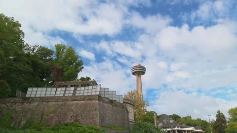 Iconic Skylon Tower rises above lush greenery and stone structures under bright Stock-Footage 293493054