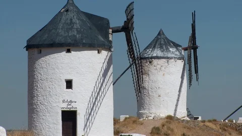 The iconic Spanish windmills of Consuegra, Spain : zoom back Stock Footage 87285437