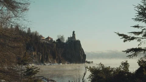 Iconic Split Rock Lighthouse perched atop a sheer cliff on Lake Superior's Stock Footage 328668960