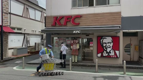 The iconic statue of the famous fried chicken shop was dressed up like an anc Stock Footage 193304822