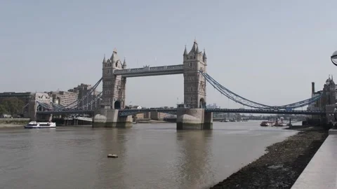 Iconic Tower Bridge crossing the River Thames, London Stock Footage 250176340