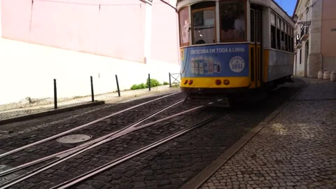 The iconic tram 28. The narrow streets of Lisbon. Alfama and Saint Vincent. Stock Footage 201952353