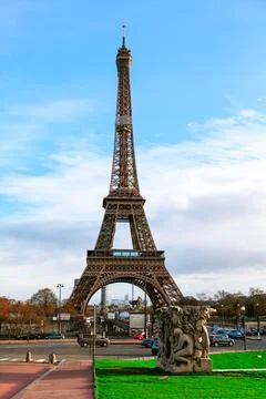 Iconic view of the Eiffel Tower rising against blue sky Stock Photos