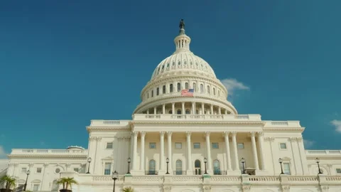 Iconic washington d c landmark united states capitol building with american.. Stock Footage 334768352
