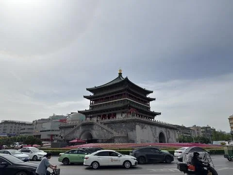 Iconic Xi'an Bell Tower Overlooking a Bustling Urban Intersection, Shaanxi, Stock Photos