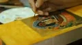 Iconography. Icon painter at work in icon painting workshop. HD 影片