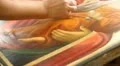 Iconography. Icon painter at work in icon painting workshop. HD Footage