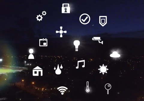 Icons interface of Internet Of Things over night city background Stock Photos