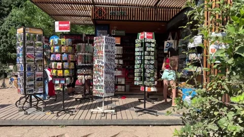 Icons magnets postcards everything What is sold in the Albanian kiosk on the Stock Footage 249939486