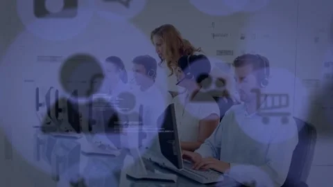 Icons or code fading in over callcenter, supervisor walking row checking agent Stock Footage 333105905