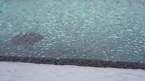 Icy car. Car windshield close up. Traveling on vehicles during a cyclone Stock Footage 166811992