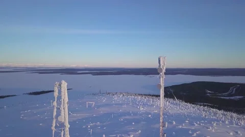 Icy cellular base station antenna covered with snow. Cell site tower on moutain Stock-Footage 148749029