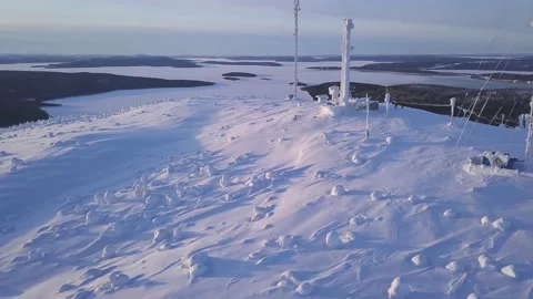 Icy cellular base station antenna covered with snow. Cell site tower on moutain Stock-Footage 148749199