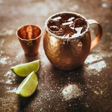 Icy Cold Moscow Mule cocktail with Ginger Beer and tequila Stock Photos