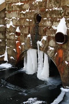 Icy drain Stock Photos