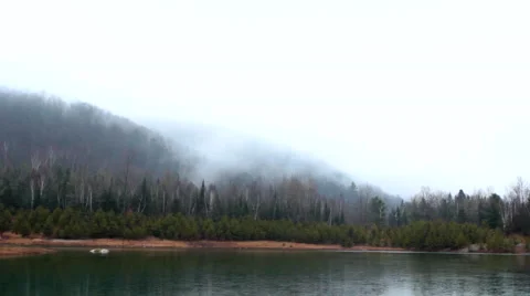 Icy lake and forest in Quebec Stock Footage 44300686