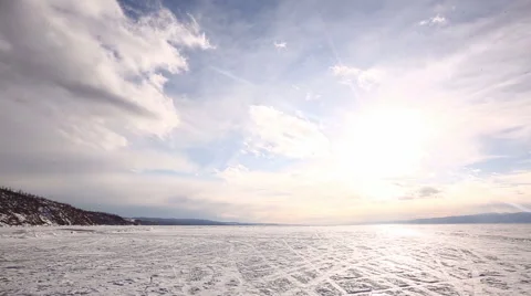 Icy lake surrounded by mountains Stock Footage 49062001