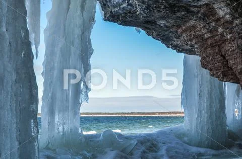 Icy limestone cliffs at the coast of the swedish island öland in the baltic Stock Photos