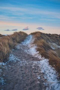 Icy path at the beach in winter in denmark Stock Photos