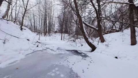 Icy river bed in cold winter nature Stock Footage 323338791