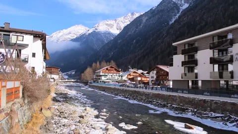 Icy river flowing through the Otztal Valley in Solden Alpine resort Stock Footage 253070133