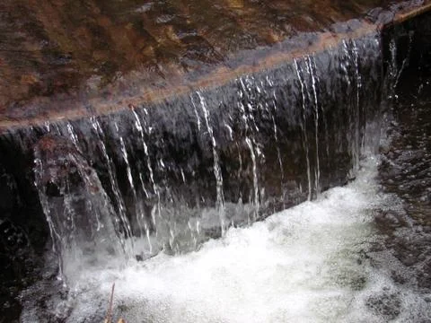 Icy running brook 스톡 사진