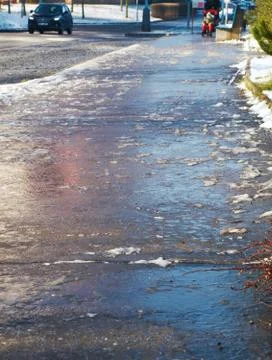Icy sidewalk Stock Photos