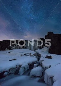 Icy Snow Covered Landscape Underneath Starry Night Sky, Thingvellir, Iceland
