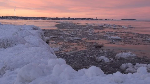 Icy waters at sunset Stock Footage 100138203