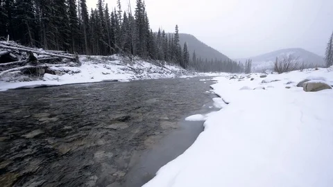 Icy winter river in snowstorm Video stock 85498011