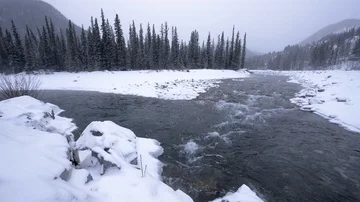 Icy winter river in snowstorm Stock Footage 85500772