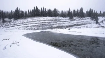 Icy winter river in snowstorm Video stock 85507169
