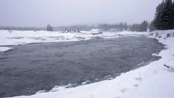 Icy winter river in snowstorm Video stock 85509658