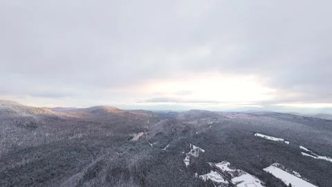 Icy winter river through mountain fields Stock Footage 321178705