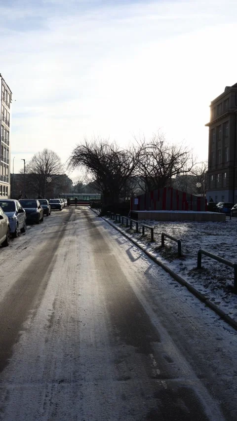Icy winter street with sunlight Stock Footage 326192976