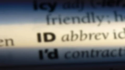 ID word in a dictionary. Stock Footage 99560658