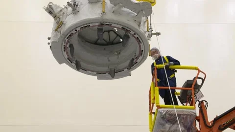 IDA-3 being lowered during installation into trunk SpaceX Dragon spacecraft Stock Footage 289728871