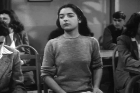 Ida eagerly wait for her mother to appear during school function - 1947 스톡 동영상 108989657