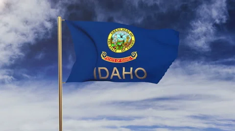 Idaho flag with title waving in the wind. Looping sun rises style.  Animation Stock-Footage 48164130