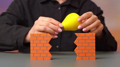 An idea that breaks through barriers. Creative disruption challenges established Stock Footage 342258872