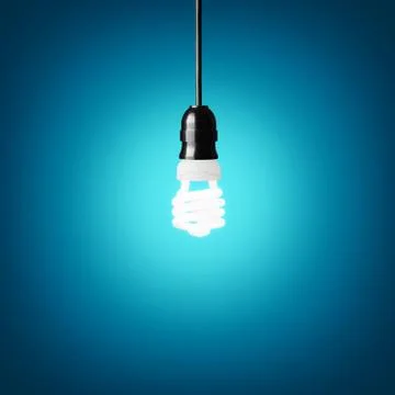 Idea concept with bulb on blue background. Stock Photos