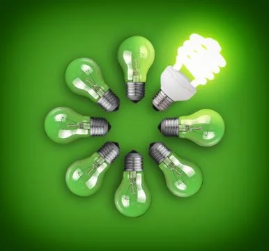 Idea concept with circle of light bulbs and glowing eco bulb Stock Photos