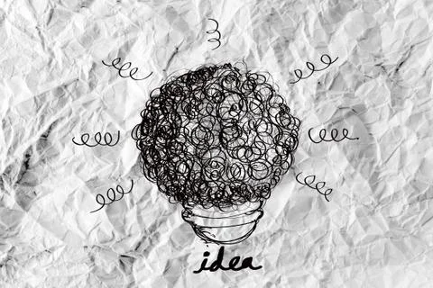 Idea concept light bulb on crumpled paper Stock Illustration