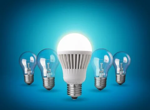 Idea concept with light bulbs on blue background Stock Photos