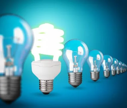 Idea concept with light bulbs on blue Stock Photos