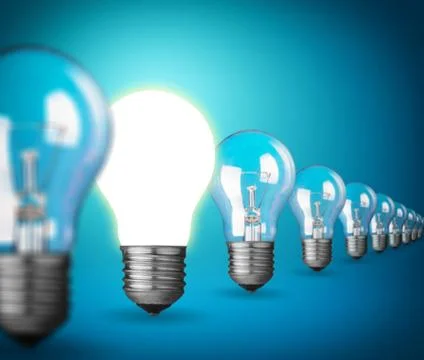 Idea concept with light bulbs on blue Stock Photos